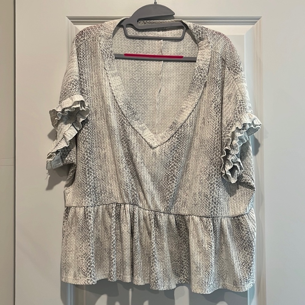 Grey and white V neck top